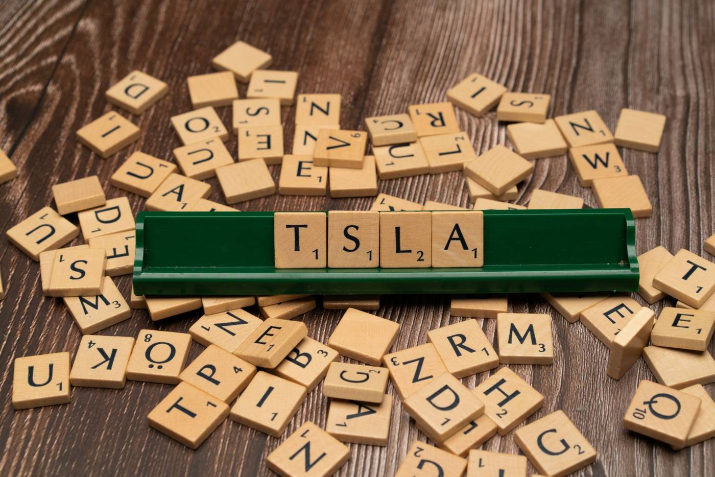 Tesla shares fell 1.9% to $374.68 on June 21, 2026, as the SpaceX selloff and AI valuation concerns pulled Musk-linked assets…